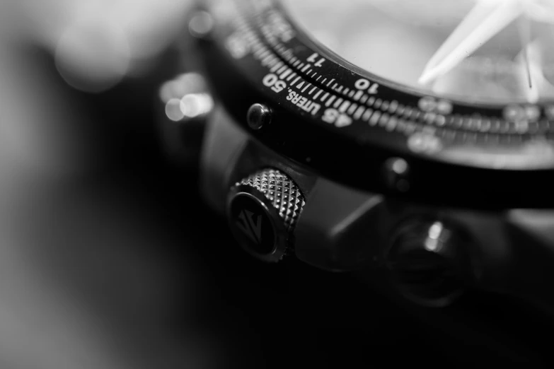 a close - up image of a watch with focus on the hour