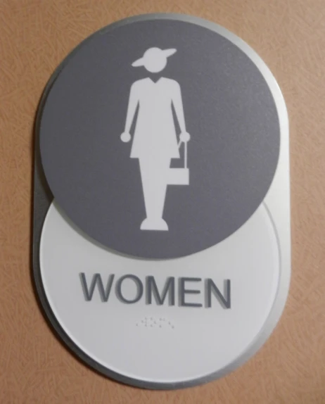 a picture of two round signs with a woman in a hat and handbag