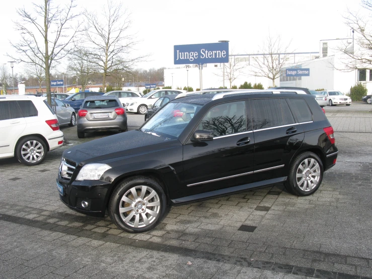 a black and silver vehicle parked in a parking lot