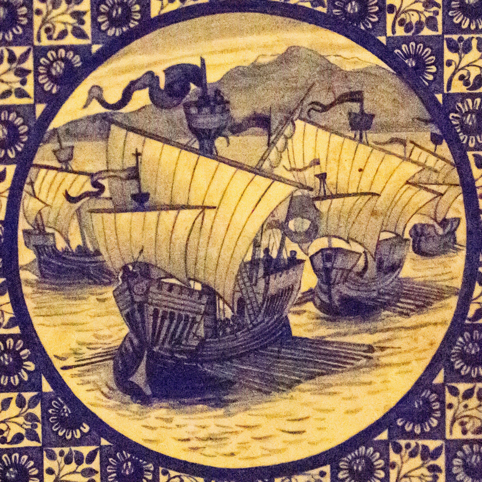 antique ceramic with sailing ships on blue background