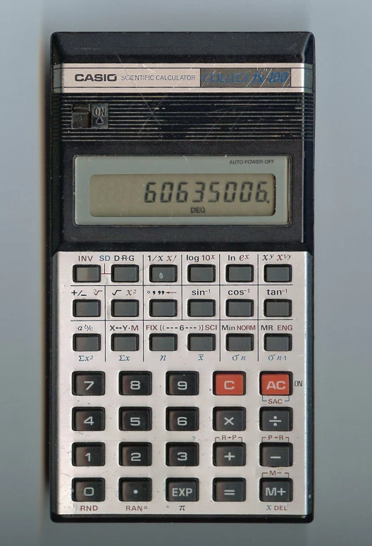 a calculator with a large lcd clock on top