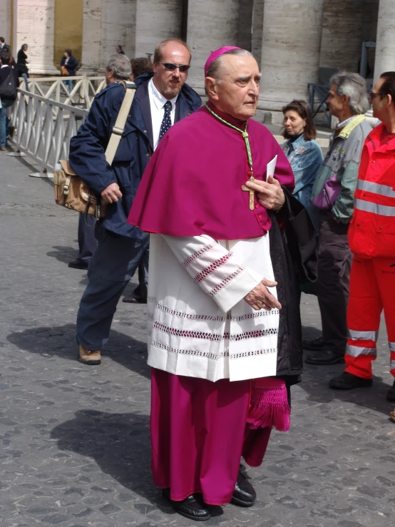 a group of people dressed in red and white clothes