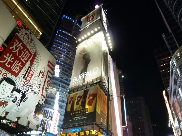 the night view of an oriental city intersection