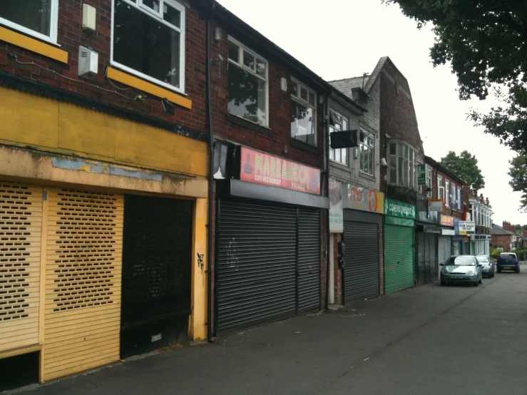 a line of stores on a city street