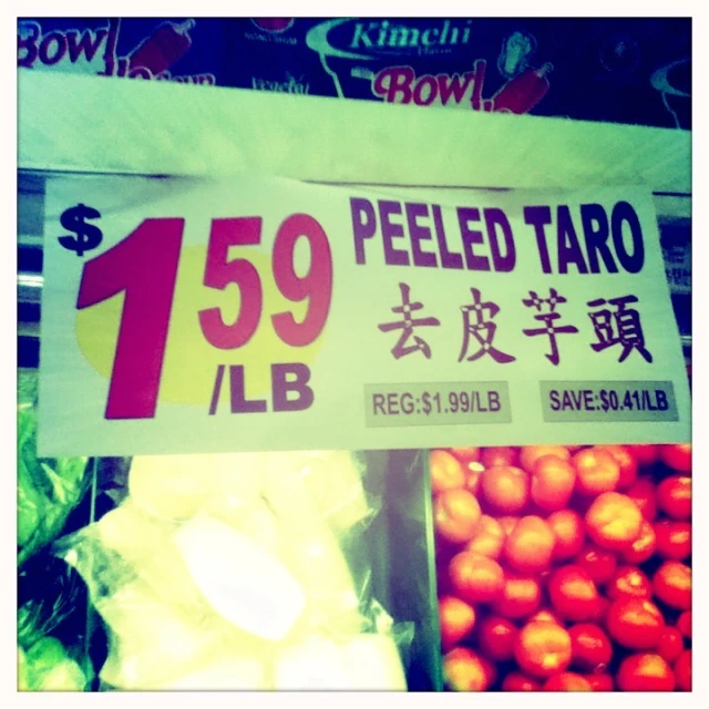 a sign that reads $ 599 peeled taco / bleach