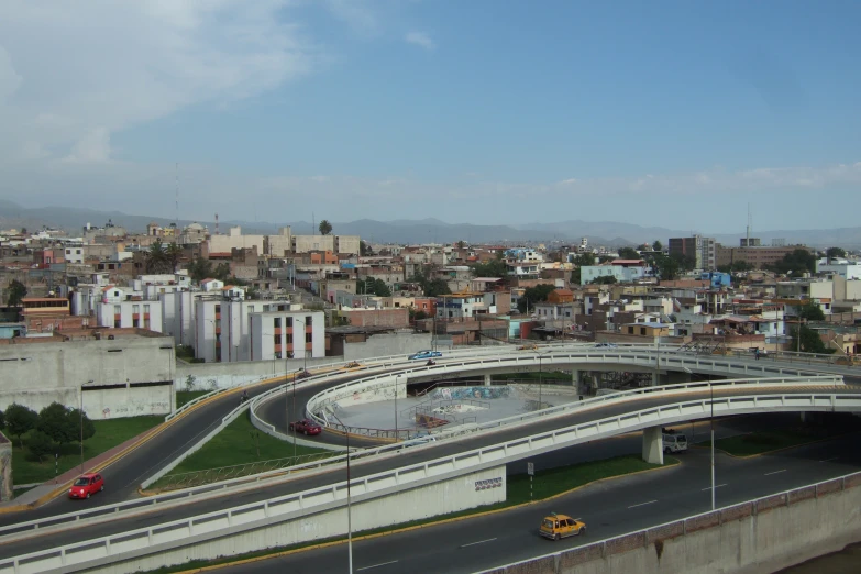 aerial view of a city and freeway with no cars