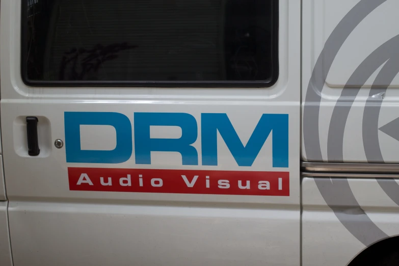 the truck's decal says drm audio visual