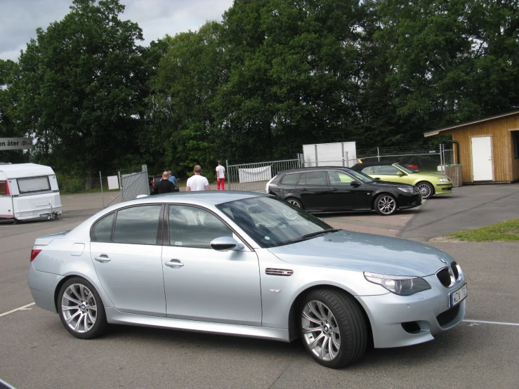 some cars are parked in a parking lot