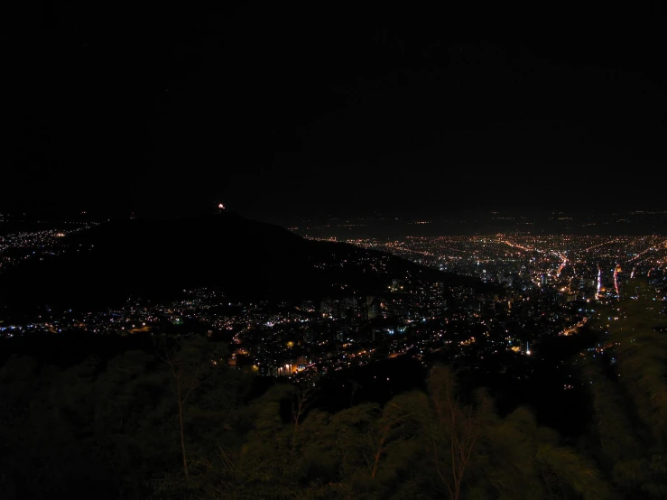 a nighttime view of a city in the dark