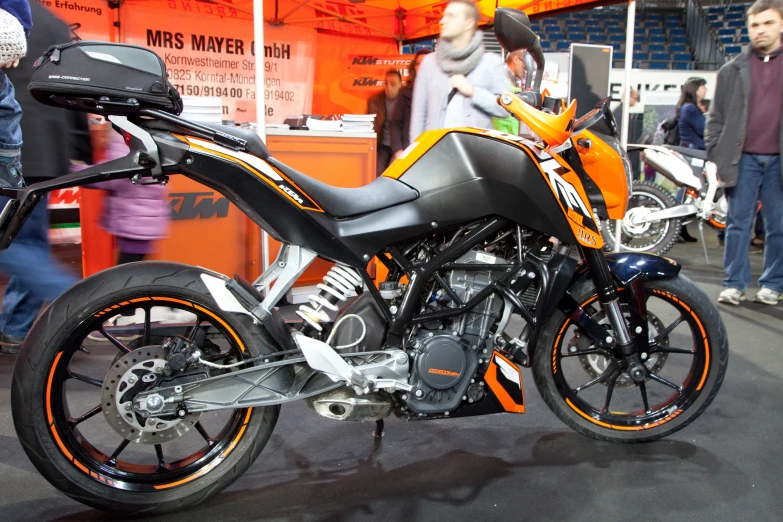 a motor bike on display at a motorcycle show