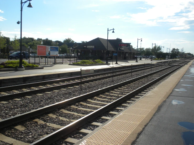 a train station has many tracks for passengers