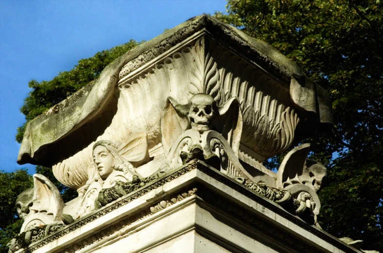 a view of a statue on top of a building