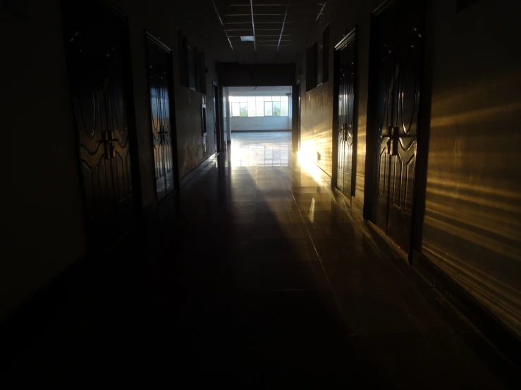 a hallway has been closed, and the sun is shining brightly