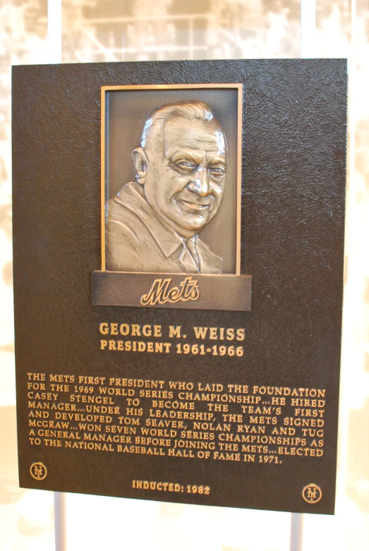 a plaque with a picture of a person on it