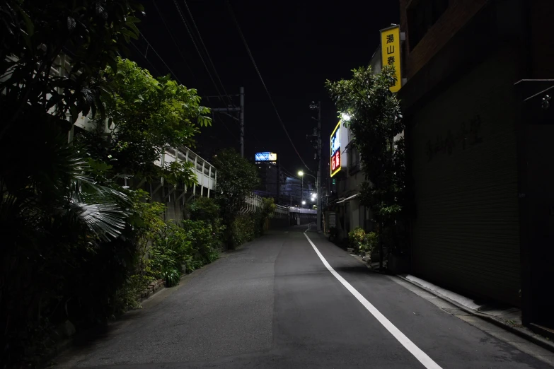 the view of a narrow street in the city