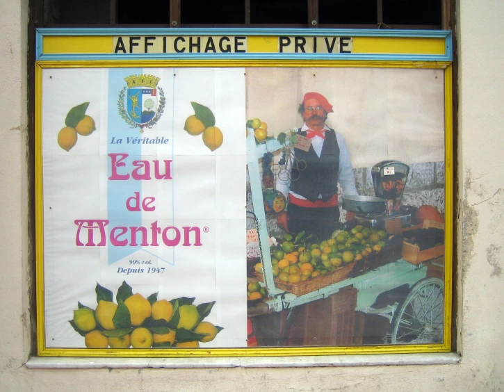 a window with a sign on it says, sau de menton