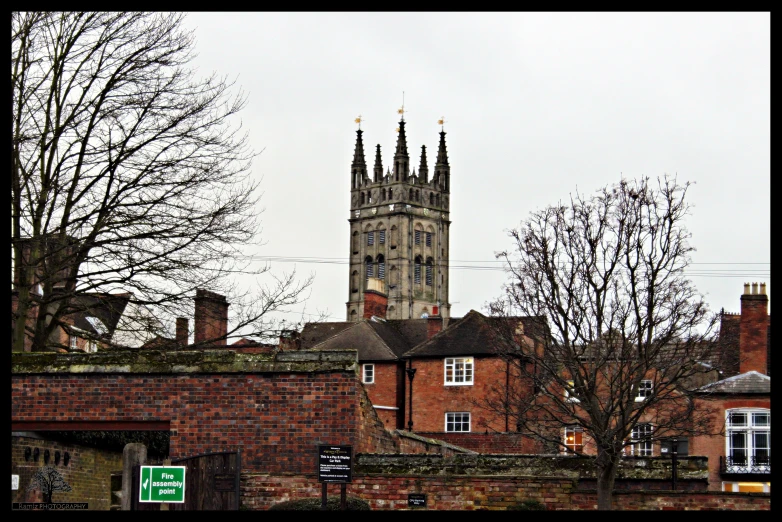 the top of a building that has an old bell tower