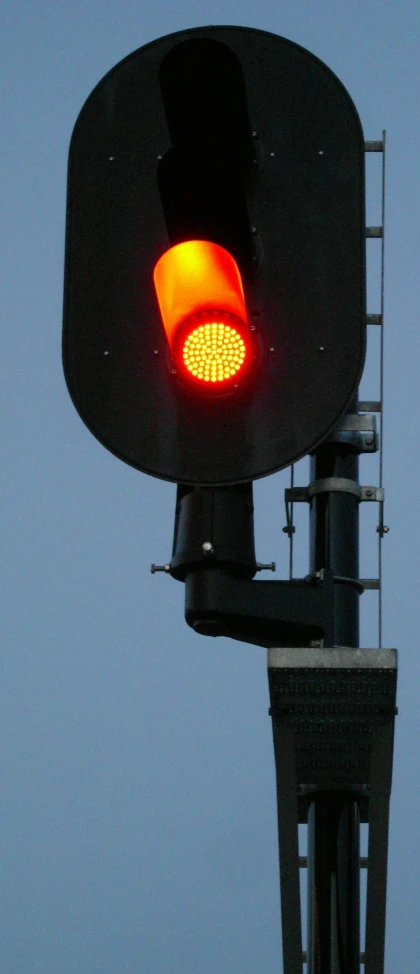 a stop light with the lights turned yellow
