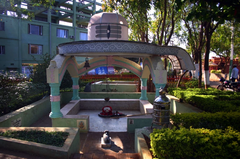 an outdoor patio with a clock on it