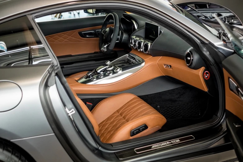 the inside of the car is shown in brown and black