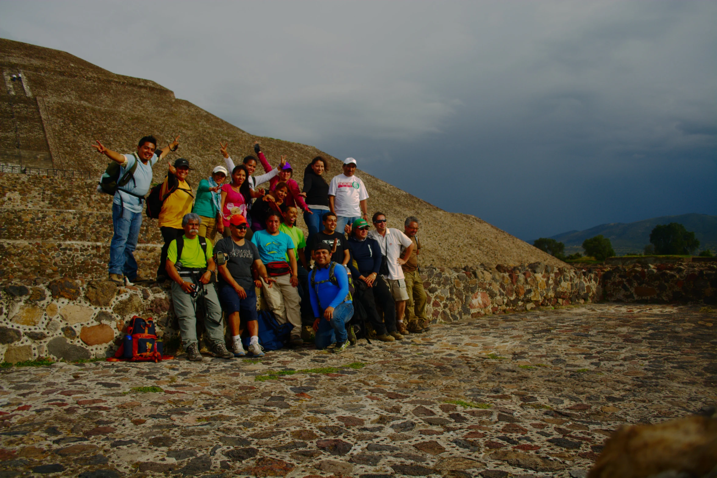 a group of people that are standing in front of some buildings