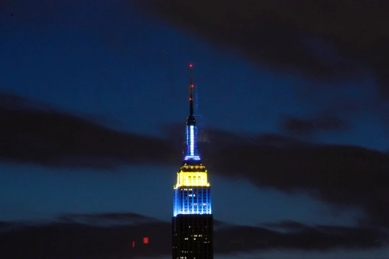 view from atop a building lit up at night