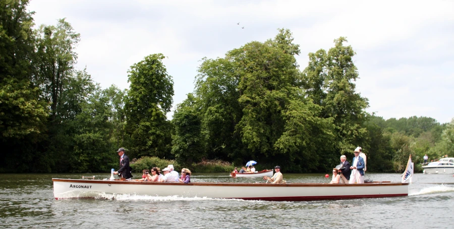 people and their belongings are riding in a canoe