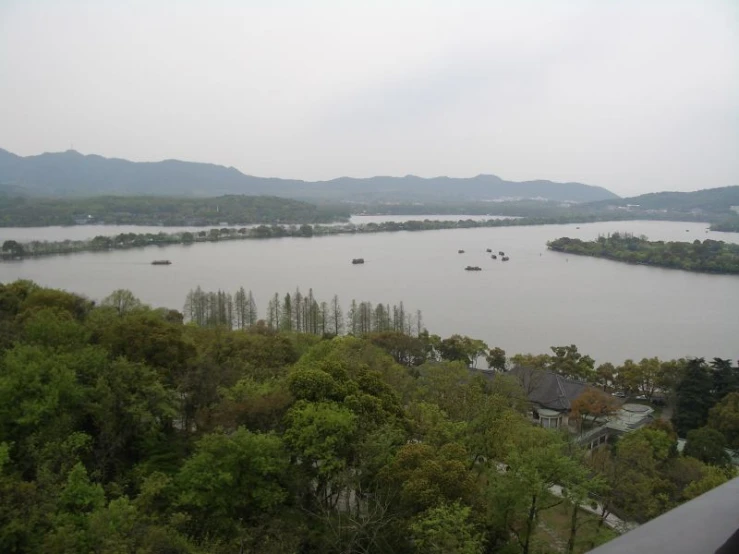 an island on the water with boats in it