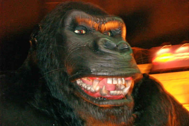 a fake gorilla with a teeth and fangs