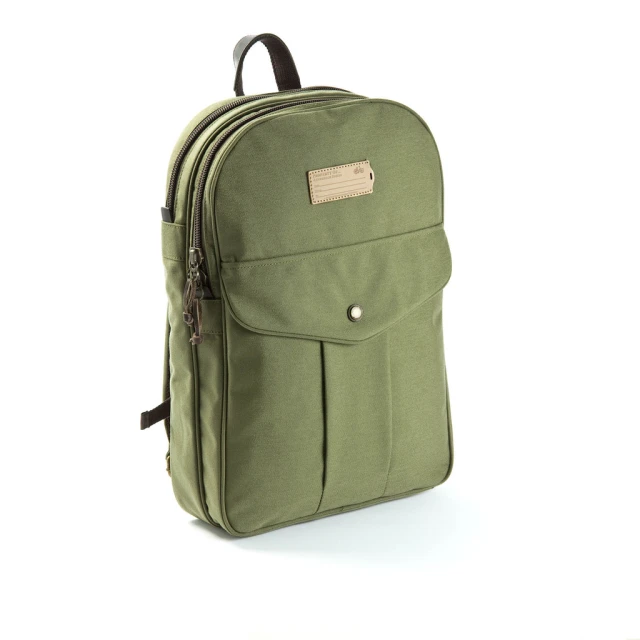 an open green back pack on a white background