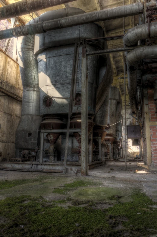 an old industrial scene with pipes and dust