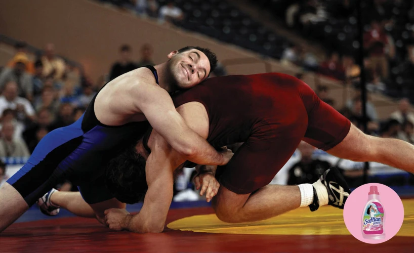 a man wrestling in a sumo ring in a competition