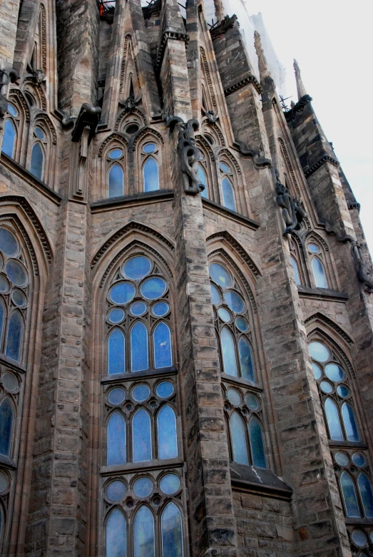 the church tower features stained glass windows and elaborate carvings