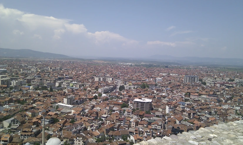 a city view looking from a hill side on a sunny day