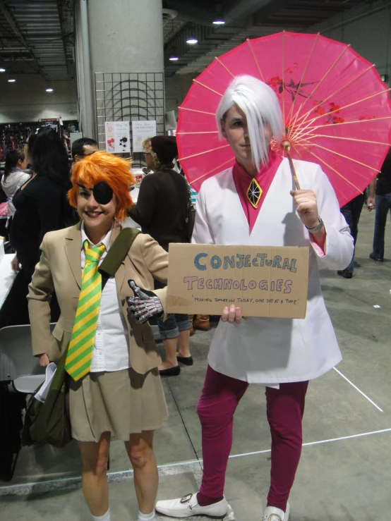 two people dressed as cartoon characters holding umbrellas