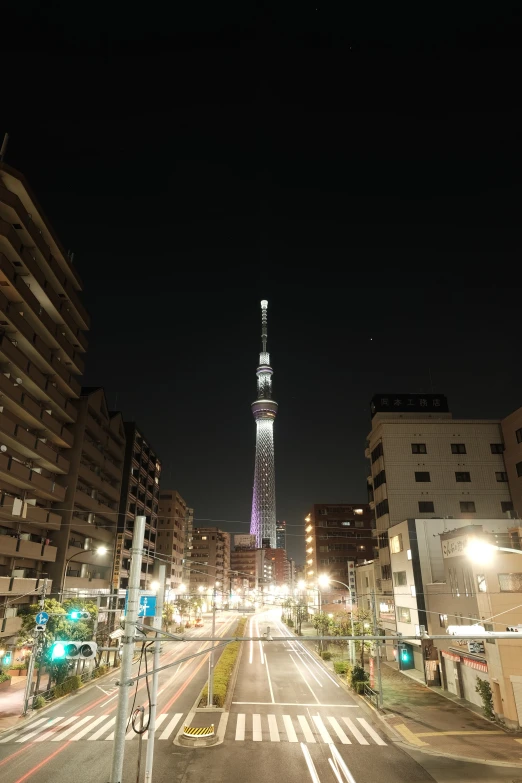 the skyscr towers above this city street