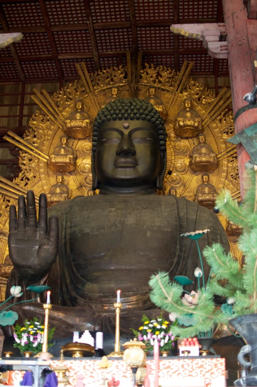 the statue in the temple has a large hand