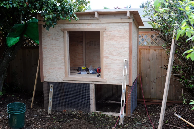 a chicken coop built in the backyard