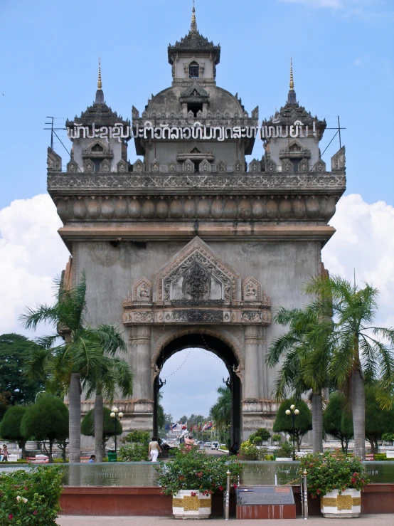 a stone arch with arches is a monument