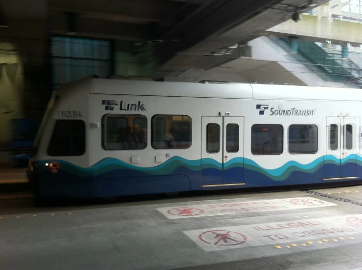 there is a train that has blue and white design on it