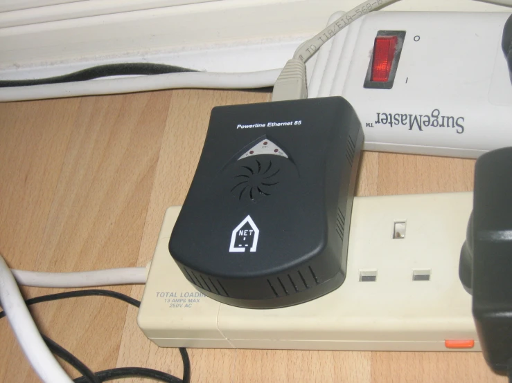 a cordless telephone with an in - wall outlet