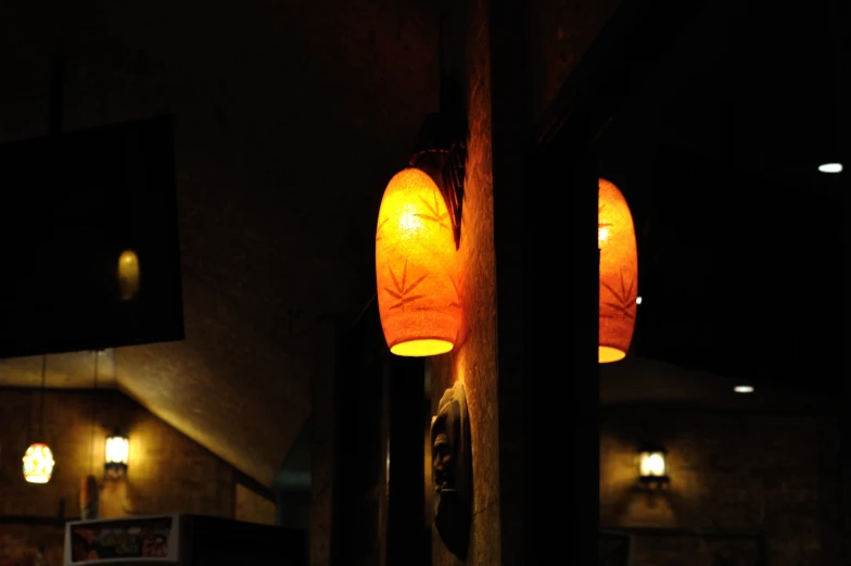 a pair of lights sitting on the side of a wall