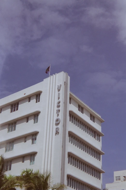 the side of a white building on a clear day