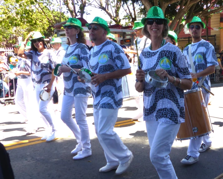 a group of people that are standing in the street