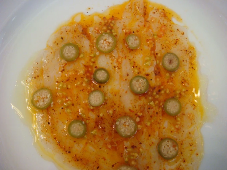 some meat and vegetable food on a plate