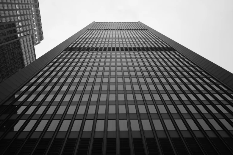 an upward view of a skyscr building