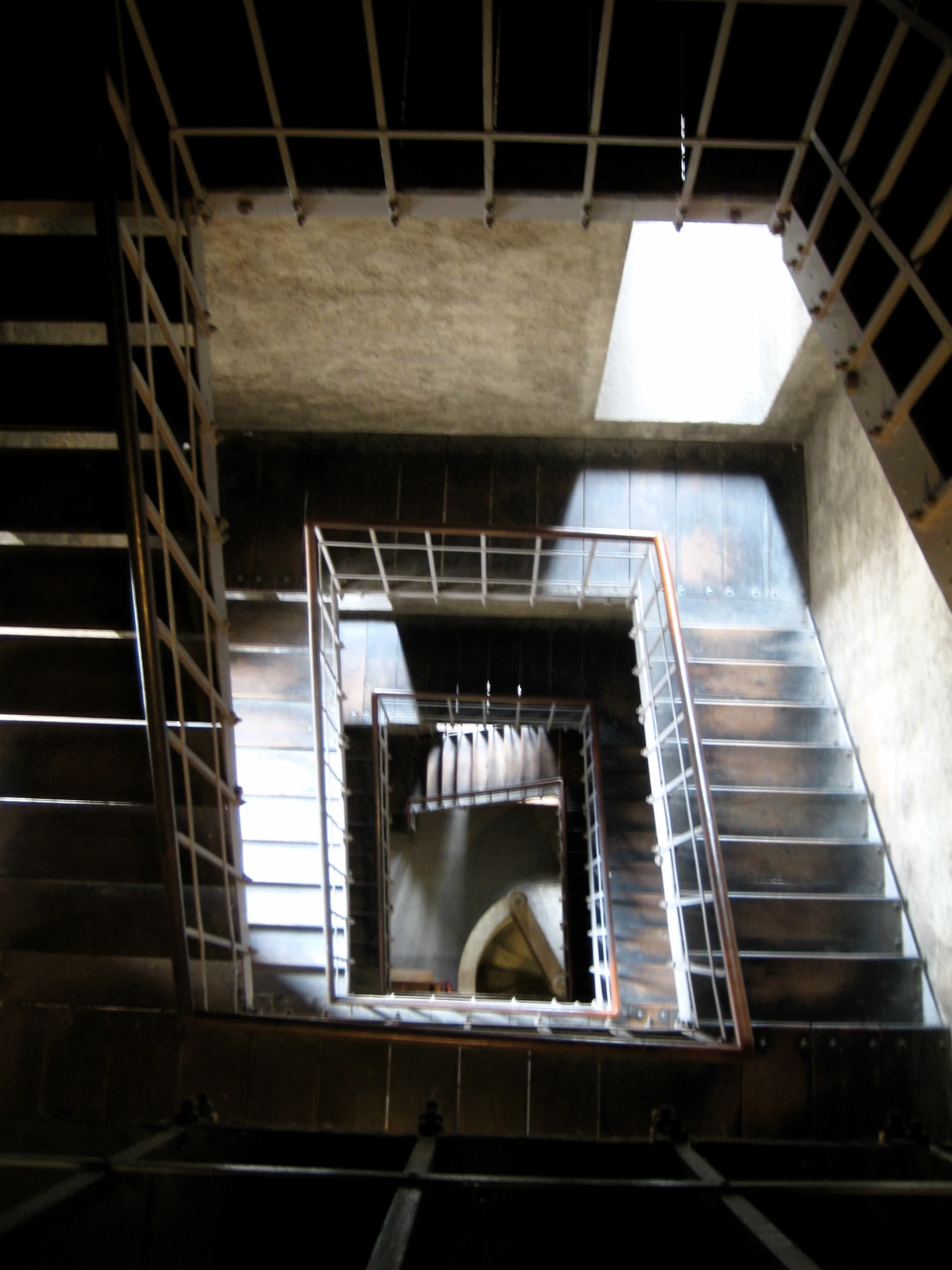 looking down at stairs and the sky