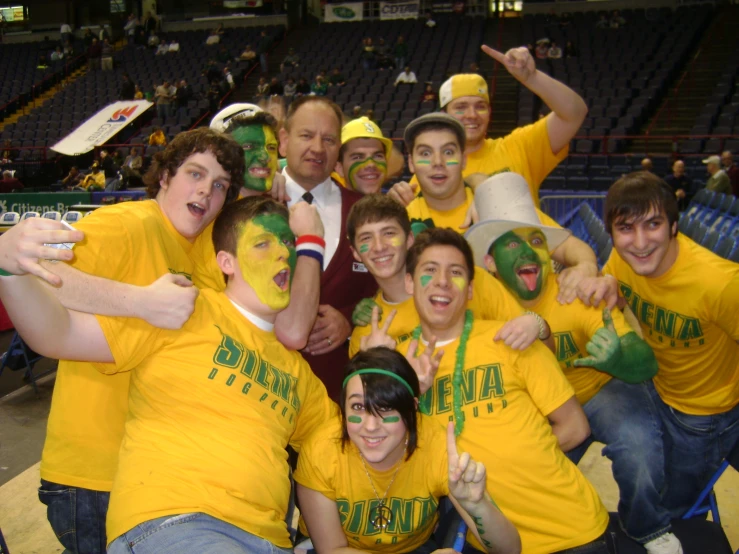 a group of young people all with face paint