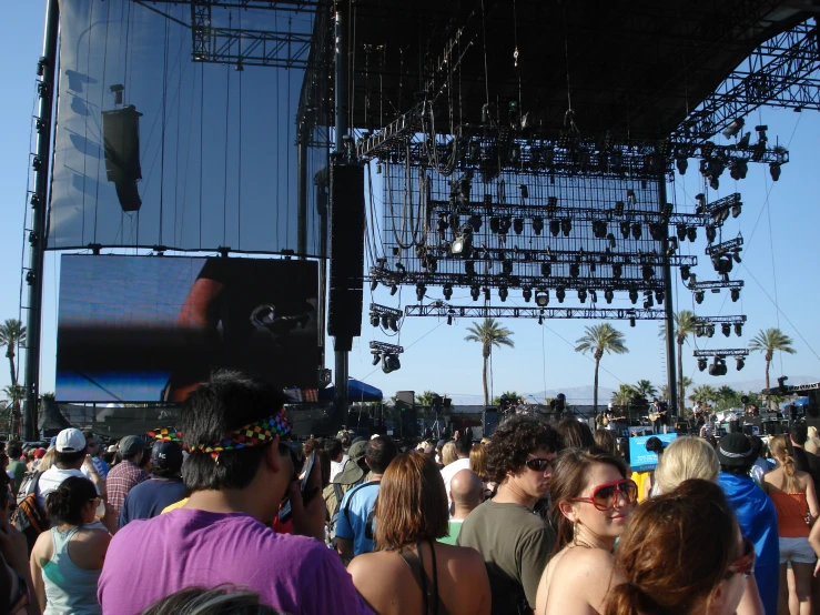 the crowd is watching music on the stage