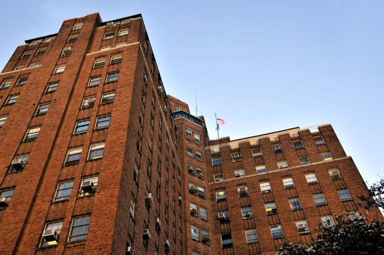 an old building with many windows and lights